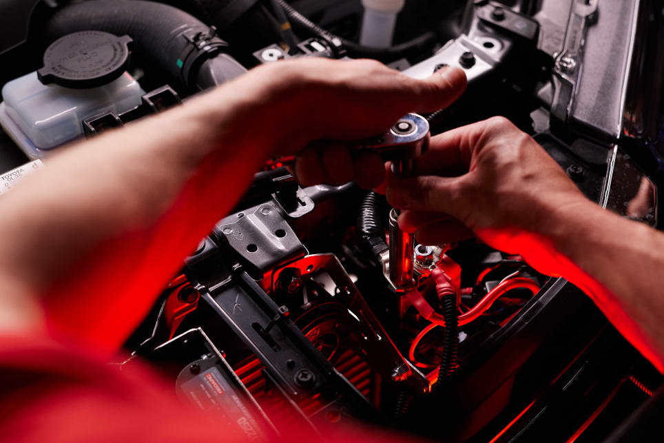 This Redarc BCDC1225D unit is being installed in a HiLux's engine bay. (image credit: Redarc)