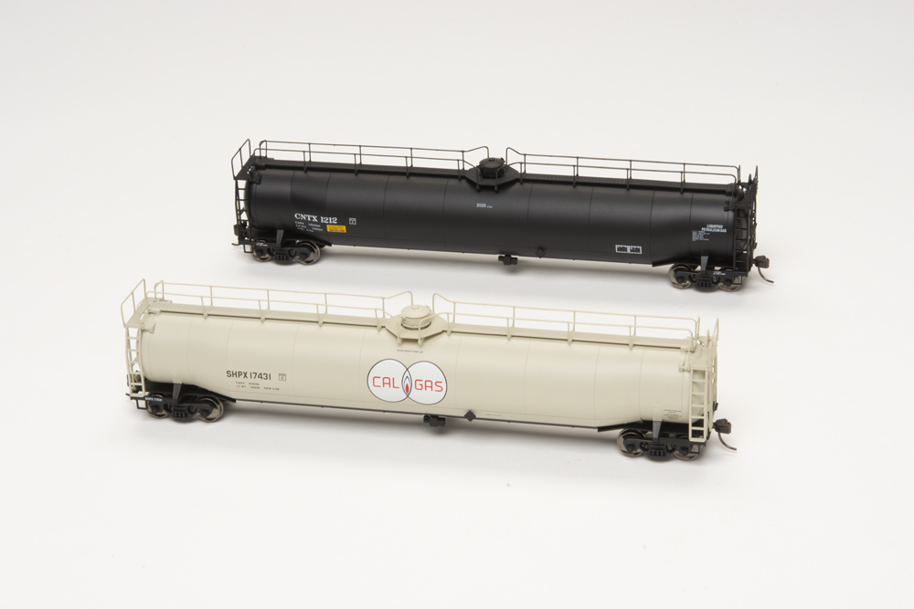 American Car & Foundry 33,000-gallon tank cars in Cal Gas and Continental Tank Car Corp scheme.